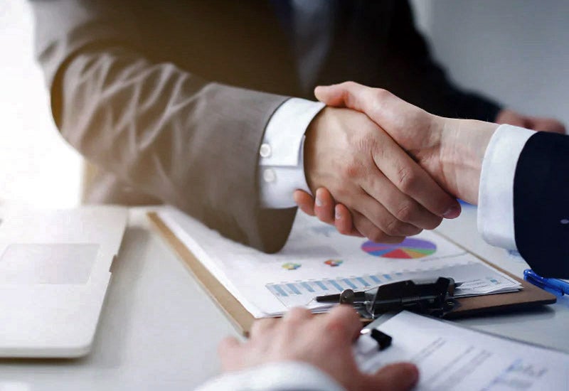 Handshake over an auto finance deal